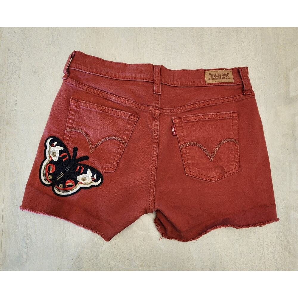 Levis Women's Cut off Denim Shorts SZ 4 Distressed Butterfly Patch Rust - Picture 1 of 11